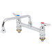 A T&S chrome deck-mounted faucet with lever handles.