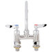 A T&S chrome deck-mounted faucet with lever handles.