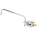 A T&S chrome wall mount faucet with lever handles and a long swing spout.