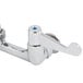 A chrome Equip by T&S wall mount faucet with wrist handles.