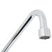 A T&S chrome wall mount faucet with lever handles and a swing spout.
