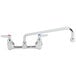 A T&S chrome wall mount faucet with two lever handles.