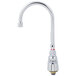 A silver T&S deck-mounted workboard faucet with gooseneck spout and wrist handles.