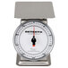 A Cardinal Detecto stainless steel portion scale with a rotating dial.