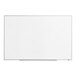 A Quartet melamine white board with a silver metal frame.