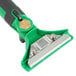 An Unger ErgoTec SwivelLoc squeegee handle with a green and black handle.