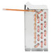 An Avantco condenser coil with copper pipes inside a metal box.