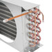 An Avantco condenser coil with copper pipes and metal fins.