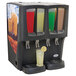 A Crathco refrigerated beverage dispenser with different colored drinks in plastic cups with lids.