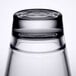 A close up of a Libbey stackable rocks glass on a table in a bar.