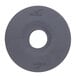 A black rubber Metro donut with a hole in the middle.