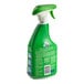 A green SC Johnson spray bottle with white label.