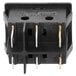 A black Avantco On / Off Switch with gold and silver terminals.