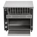 A Vollrath conveyor toaster with a rack on top.