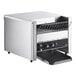 A stainless steel Vollrath conveyor toaster on a counter.