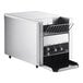 A Vollrath stainless steel conveyor toaster on a counter.