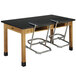 A black National Public Seating Elephant Z-Stool with metal legs.