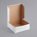 A white bakery box with a lid.