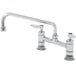 A T&S chrome deck-mounted pantry faucet with lever handles.