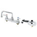 A T&S deck-mounted workboard faucet with lever handles and side spray hose.
