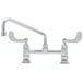 A T&S chrome deck-mounted pantry faucet with wrist handles.
