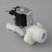 An Avantco solenoid valve with a white plastic body and black and silver metal connectors.