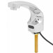 A silver T&S hands-free sensor faucet with a black cord.