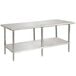 An Advance Tabco stainless steel work table with undershelf.
