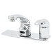 A T&S chrome hands-free sensor faucet with a single spout above a deck plate.