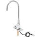 A chrome T&S ChekPoint hands-free sensor faucet with a gooseneck spout on a counter.