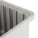 A Metro gray tote box with four compartments.