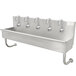 A stainless steel Advance Tabco multi-station hand sink with electronic faucets.
