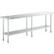 A long silver Regency stainless steel work table with galvanized metal legs and two shelves.