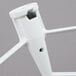 A white coated flat beater attachment with a hole.