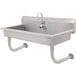 An Advance Tabco stainless steel multi-station hand sink with an electronic faucet.