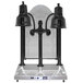 A black Hanson Heat Lamps carving station with two black bulbs on a silver surface.