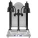 A black Hanson Heat Lamps dual bulb carving station with heated stainless steel base.