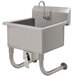 An Advance Tabco stainless steel hand sink with a knee operated faucet.