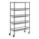 A black wire shelving unit with baskets and a shelf on wheels.