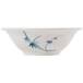 A white melamine bowl with blue bamboo designs.