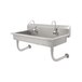 A stainless steel Advance Tabco multi-station hand sink with 5 electronic faucets.