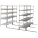 A Metro qwikTRAK double deep metal shelving unit with wheels.