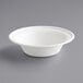 A white EcoChoice Compostable Sugarcane bowl with a white rim.