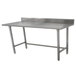 A stainless steel Advance Tabco work table with a backsplash.