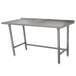 An Advance Tabco stainless steel work table with legs and a backsplash.