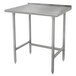 A stainless steel Advance Tabco work table with galvanized legs.