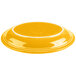 A yellow platter with a white rim.