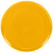 A yellow plate with a circle pattern on the rim.