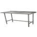 An Advance Tabco stainless steel work table with a long metal top and legs.