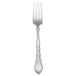 A close-up of a Oneida Satinique stainless steel dinner fork with a silver handle.